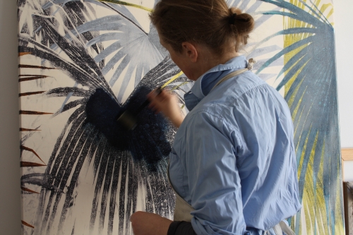 Marianne Nix applying Oil glaze