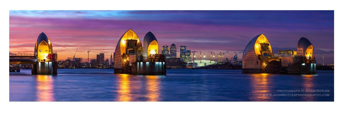 Thames Barrier, Millennium Dome & Canary Wharf at Dusk by Adam Butler ...