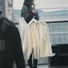 Portrait of a woman with shirts