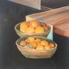 Two bowls with mandarins and oranges