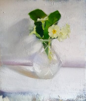 Primroses in a glass vase by Rosemary Burn