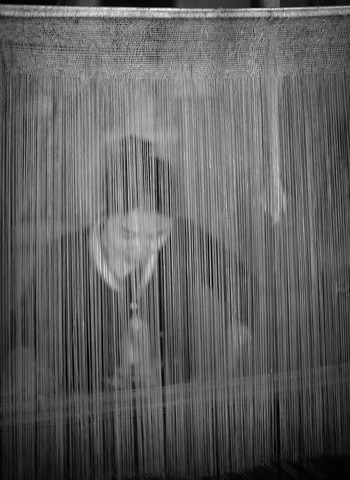 Weaver at Her Loom, Muang Ngoy Village, Laos by Geoffrey Ansel Agrons