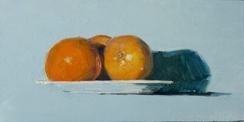 oranges in a plate on blue par Olivier Payeur