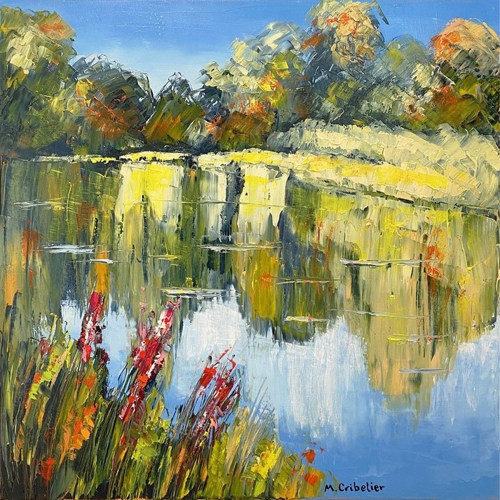 Reflets sur l'étang de Monet et fleurs rouges en premier plan à Giverny by Michel Cribelier