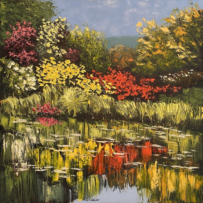 Reflets des fleurs rouges et jaunes dans l'étang de Monet à Giverny by Michel Cribelier