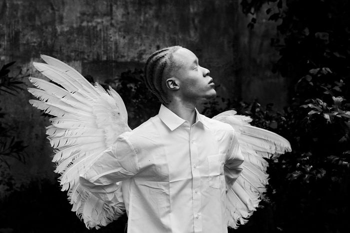 Of Feathers and Flesh III von Yannis Guibinga