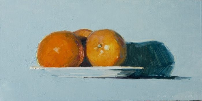oranges in a plate on blue par Olivier Payeur